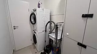 Ferienhaus Bella Casa:  Abstellraum mit Waschmaschine und Wäschetrockner